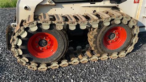 loegering over the tire skid steer tracks|bobcat loegering tracks.